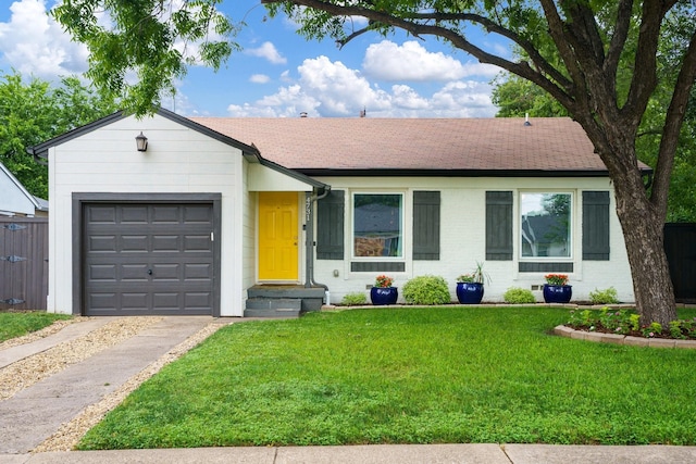 4731 Wateka Dr, Dallas, TX 75209 - single story home with asphalt driveway, a garage, a front lawn, roof with shingles, and brick siding