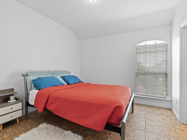 6915 Westside Pl, Sachse, TX 75048 - bedroom with vaulted ceiling and baseboards