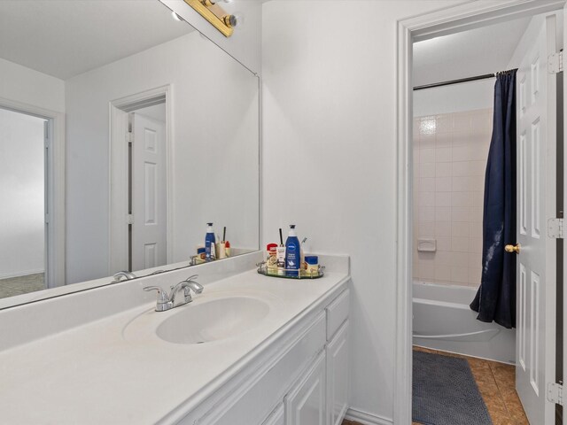 6915 Westside Pl, Sachse, TX 75048 - full bath featuring vanity, shower / bath combo, and tile patterned floors