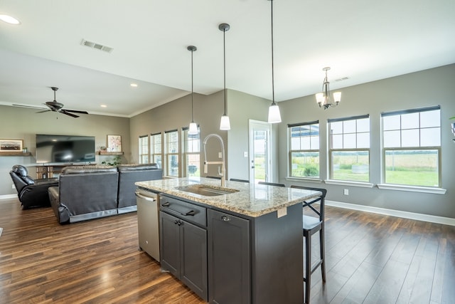 2503 Hollon Dr, Caddo Mills, TX 75135 - kitchen featuring a sink, dark wood finished floors, dishwasher, light stone countertops, and ceiling fan