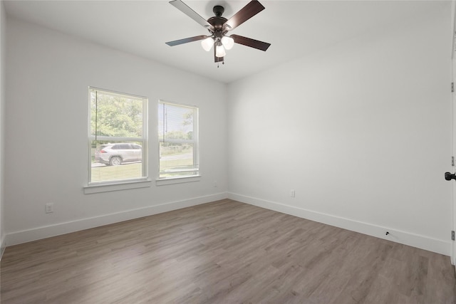220 E 7th St, Weatherford, TX 76086 - unfurnished room featuring light wood-type flooring, baseboards, and a ceiling fan