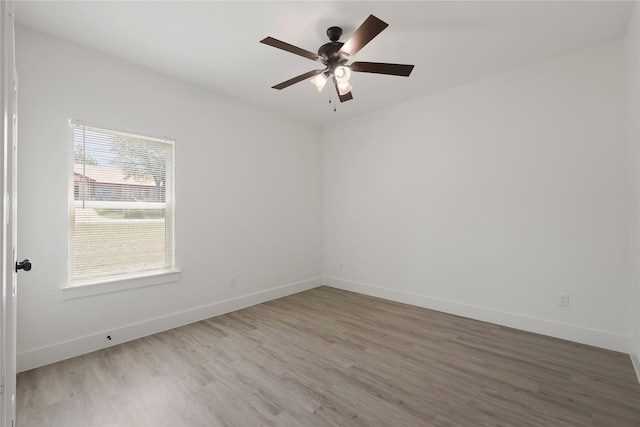 220 E 7th St, Weatherford, TX 76086 - unfurnished room featuring light wood-type flooring, baseboards, and ceiling fan