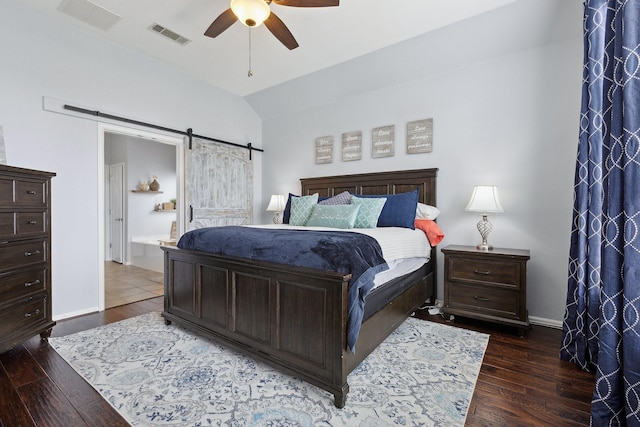 2800 Cedar Ridge Ln, Fort Worth, TX 76177 - bedroom with a barn door, wood finished floors, ceiling fan, ensuite bath, and lofted ceiling