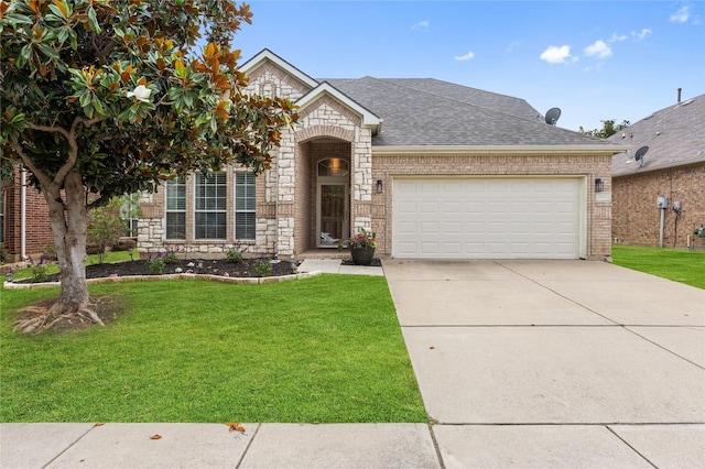 2800 Cedar Ridge Ln, Fort Worth, TX 76177 - view of front of property with stone siding, a garage, a shingled roof, and a front lawn