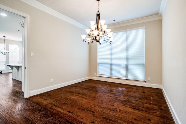 14669 Foxbriar Ln, Frisco, TX 75035 - empty room featuring a chandelier, ornamental molding, dark wood finished floors, and baseboards