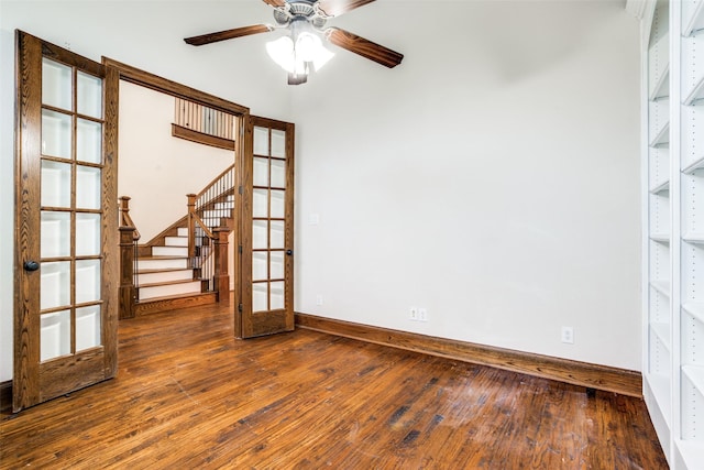 14669 Foxbriar Ln, Frisco, TX 75035 - spare room featuring baseboards, wood-type flooring, ceiling fan, and stairs