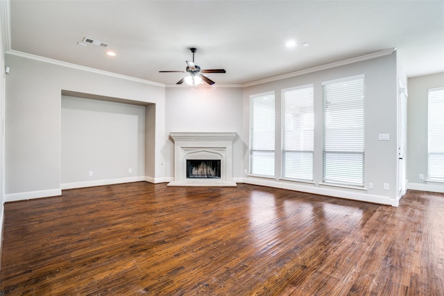 14669 Foxbriar Ln, Frisco, TX 75035 - unfurnished living room featuring ceiling fan, ornamental molding, baseboards, a fireplace with raised hearth, and wood finished floors
