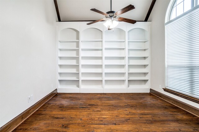 14669 Foxbriar Ln, Frisco, TX 75035 - empty room with ceiling fan, baseboards, dark wood-style floors, and built in shelves