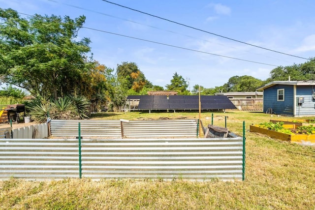 1011 Kleberg St, Alice, TX 78332 - view of yard with a vegetable garden