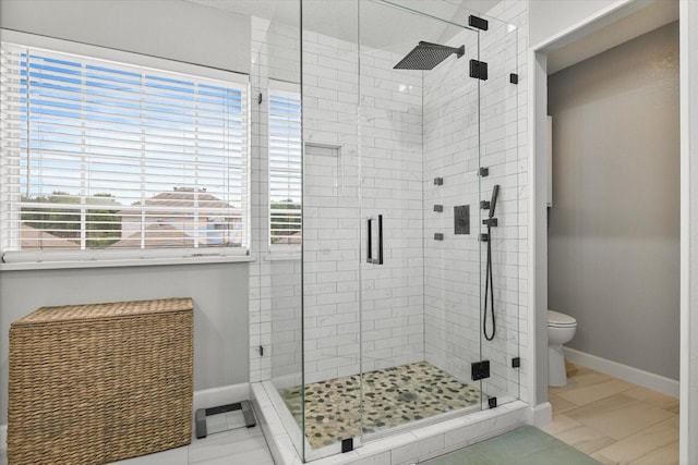 736 Fawn Valley Dr, Allen, TX 75002 - full bathroom featuring toilet, a shower stall, and baseboards