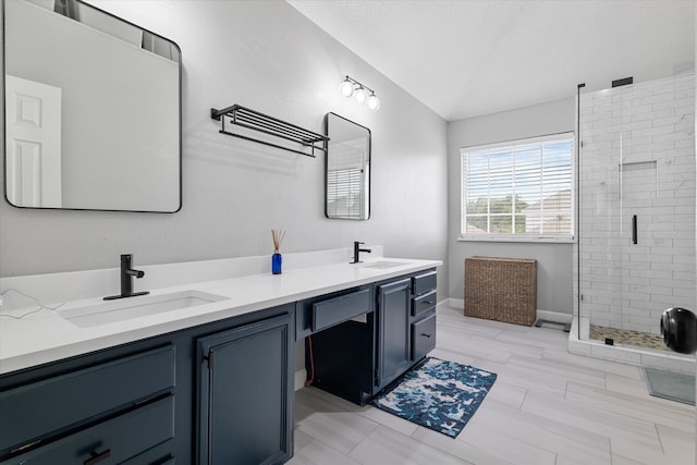 736 Fawn Valley Dr, Allen, TX 75002 - full bath featuring double vanity, a stall shower, baseboards, and lofted ceiling