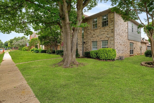 736 Fawn Valley Dr, Allen, TX 75002 - view of front of home with brick siding and a front yard