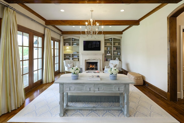 2905 Amherst Ave, University Park, TX 75225 - living area featuring wood finished floors, beamed ceiling, a warm lit fireplace, baseboards, and ornamental molding