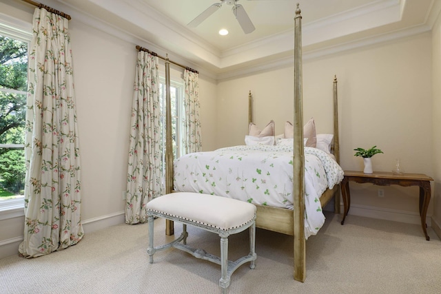 2905 Amherst Ave, University Park, TX 75225 - carpeted bedroom with ornamental molding, multiple windows, a raised ceiling, baseboards, and ceiling fan