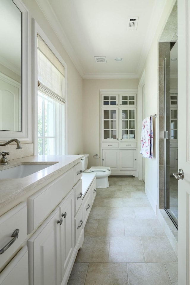 2905 Amherst Ave, University Park, TX 75225 - full bath with vanity, crown molding, a stall shower, and toilet