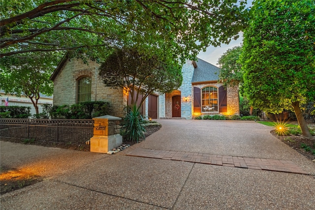 1420 Kensington Ct, Southlake, TX 76092 - french country style house featuring stone siding and concrete driveway