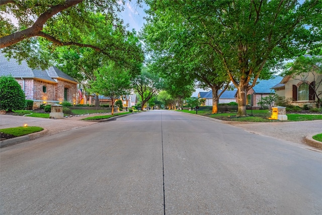 1420 Kensington Ct, Southlake, TX 76092 - view of concrete road with curbs and a residential view