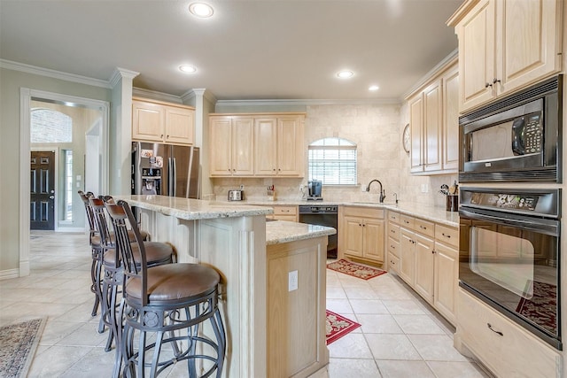 1717 Woodridge Ct, Aledo, TX 76008 - kitchen with black appliances, light brown cabinetry, ornamental molding, a breakfast bar area, and tasteful backsplash