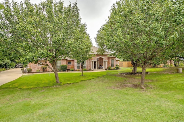 1717 Woodridge Ct, Aledo, TX 76008 - view of front of house with brick siding and a front yard