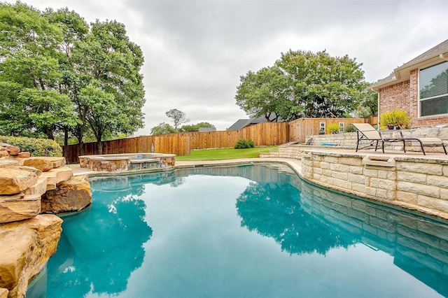 1717 Woodridge Ct, Aledo, TX 76008 - view of pool with a fenced backyard, a pool with connected hot tub, and a patio