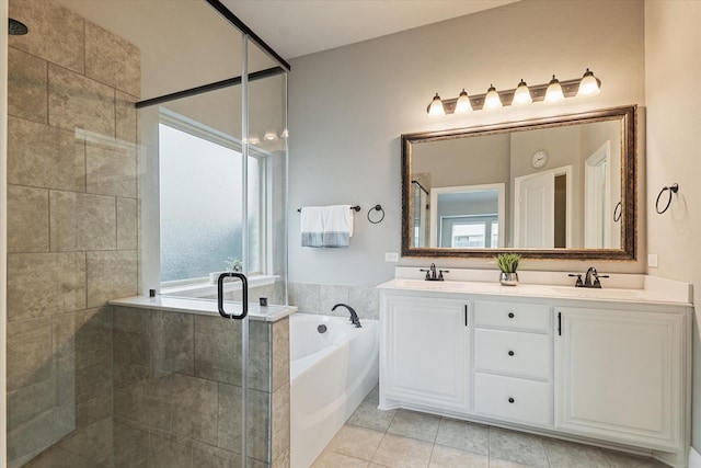 1108 Summer Ln, Mckinney, TX 75071 - bathroom featuring a garden tub, a shower stall, double vanity, and healthy amount of natural light