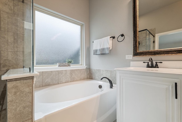 1108 Summer Ln, Mckinney, TX 75071 - full bathroom with a bath, vanity, and a tile shower