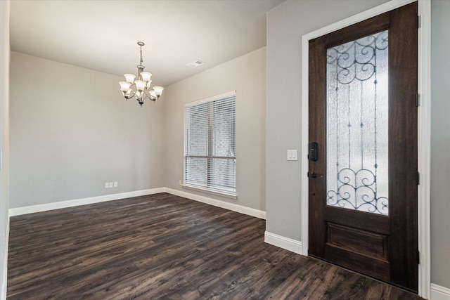 1108 Summer Ln, Mckinney, TX 75071 - foyer featuring a chandelier, baseboards, and dark wood-style flooring