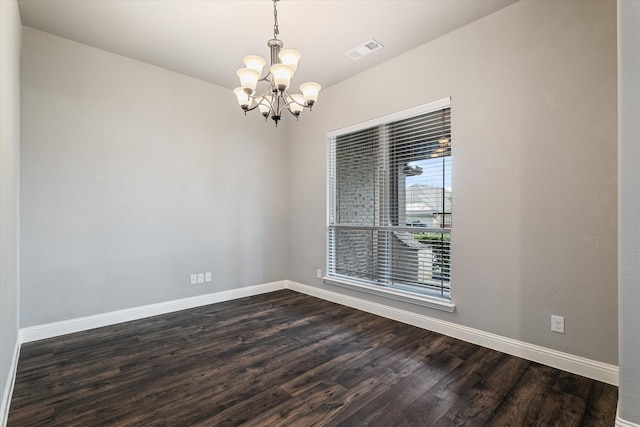 1108 Summer Ln, Mckinney, TX 75071 - empty room featuring a chandelier, baseboards, and dark wood-type flooring