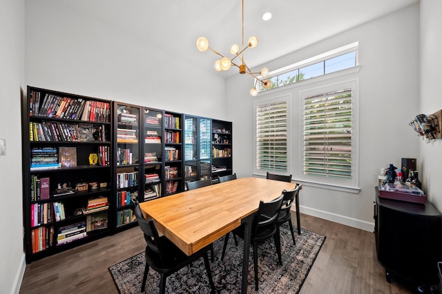 1844 Stevens Bluff Ln, Dallas, TX 75208 - dining space with a chandelier, dark wood-style flooring, and baseboards