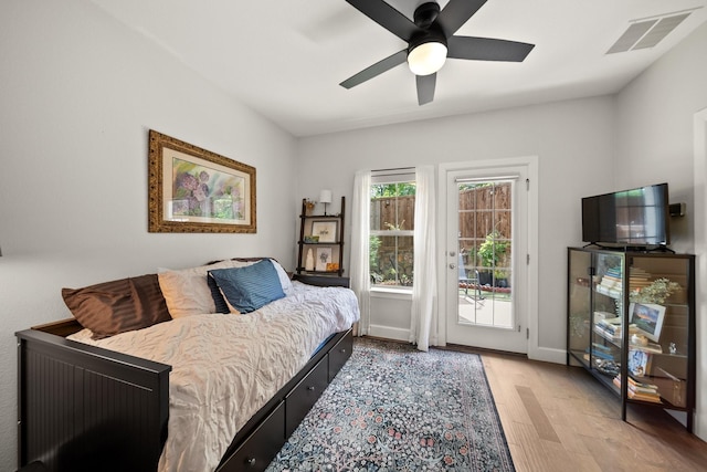 1844 Stevens Bluff Ln, Dallas, TX 75208 - bedroom with access to outside, wood finished floors, ceiling fan, and baseboards