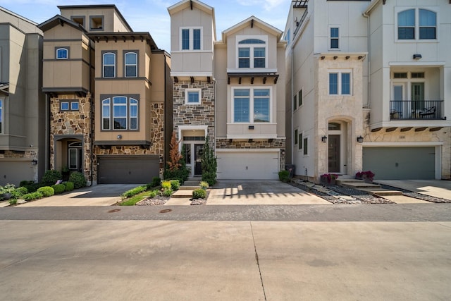 1844 Stevens Bluff Ln, Dallas, TX 75208 - view of property featuring stone siding, an attached garage, driveway, and stucco siding