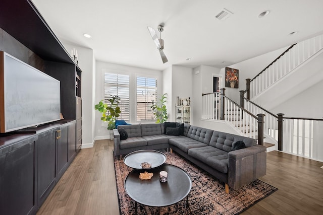 1844 Stevens Bluff Ln, Dallas, TX 75208 - living room featuring light wood finished floors, stairs, baseboards, a ceiling fan, and recessed lighting