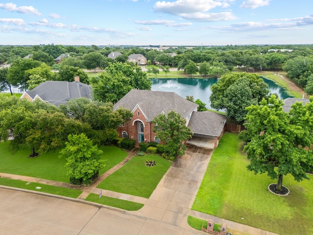 205 Lovegrass Ln, Southlake, TX 76092 - view of front of property with driveway, a front yard, brick siding, and a carport