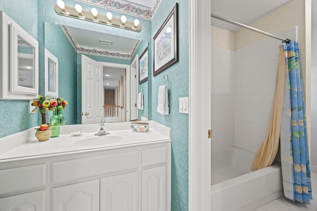 205 Lovegrass Ln, Southlake, TX 76092 - bathroom featuring shower / bathtub combination with curtain, vanity, and wallpapered walls