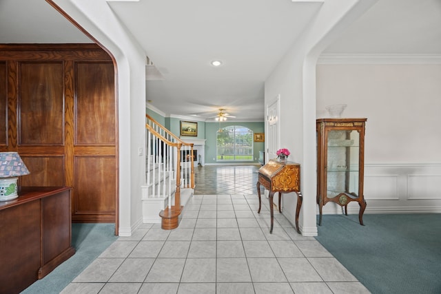 205 Lovegrass Ln, Southlake, TX 76092 - hallway with stairway, ornamental molding, and light tile patterned flooring
