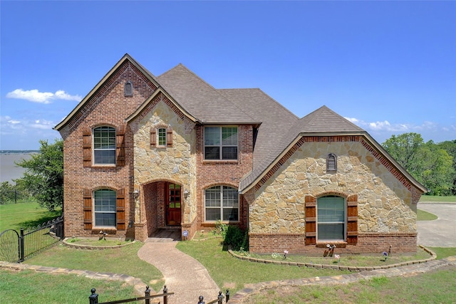 809 Cimmarron Bay Dr, Runaway Bay, TX 76426 - french country inspired facade with stone siding and brick siding