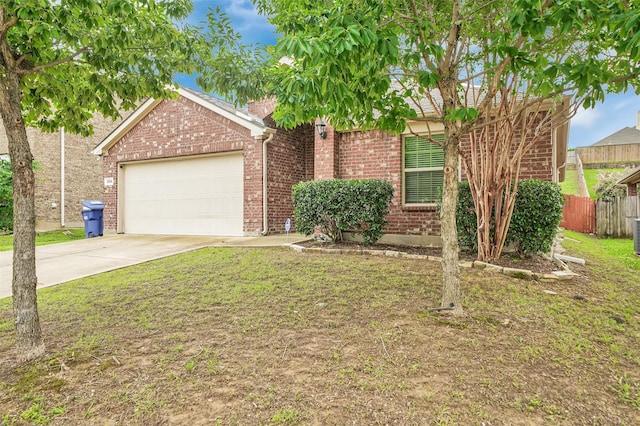 1209 Evers Dr, Mckinney, TX 75071 - view of front facade with brick siding, concrete driveway, and a garage