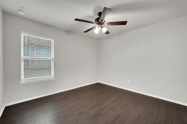 1209 Evers Dr, Mckinney, TX 75071 - spare room featuring dark wood-style floors, baseboards, and ceiling fan