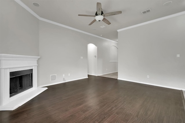 1209 Evers Dr, Mckinney, TX 75071 - unfurnished living room with a ceiling fan, ornamental molding, arched walkways, wood finished floors, and baseboards