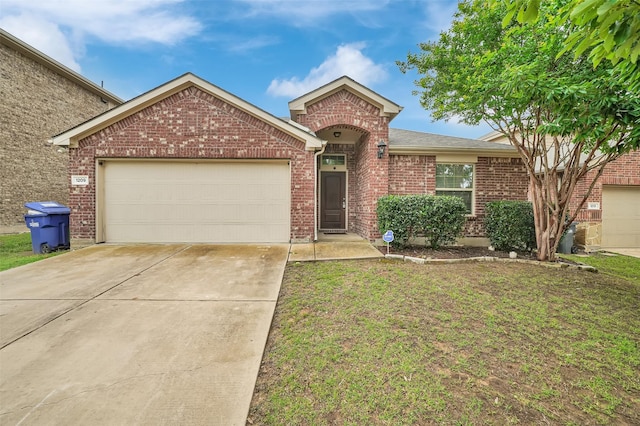 1209 Evers Dr, Mckinney, TX 75071 - view of front facade with brick siding, driveway, an attached garage, and a front yard
