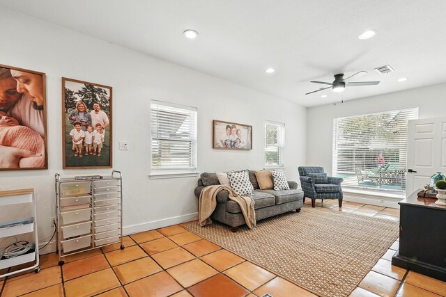 99 Glen Abbey St, Abilene, TX 79606 - living room with healthy amount of natural light, light tile patterned floors, ceiling fan, recessed lighting, and baseboards