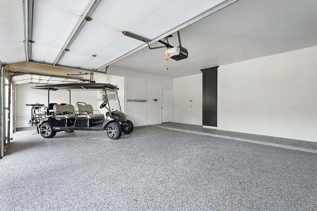 99 Glen Abbey St, Abilene, TX 79606 - garage featuring a garage door opener