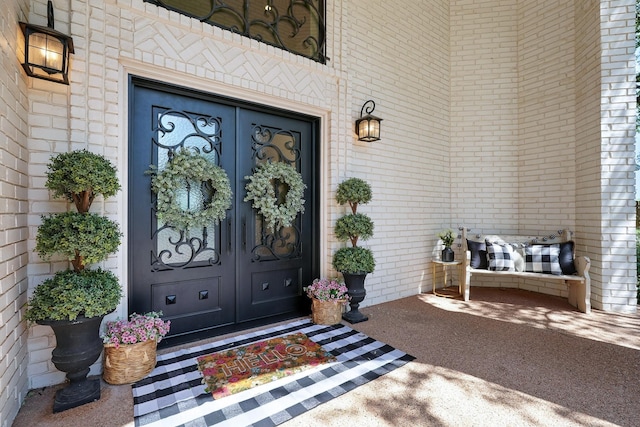99 Glen Abbey St, Abilene, TX 79606 - view of exterior entry with french doors and brick siding