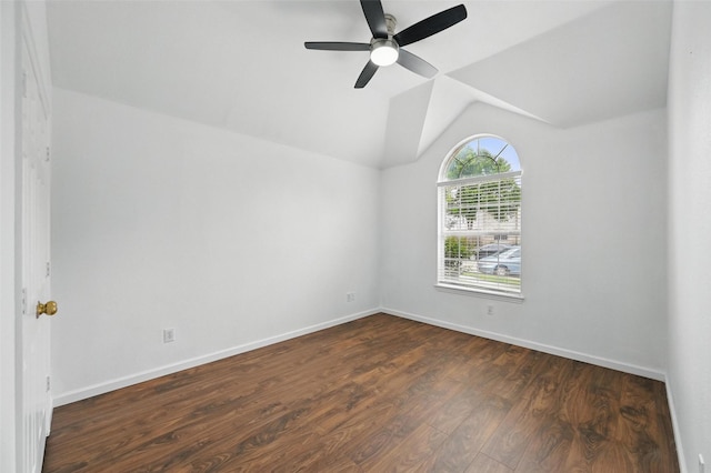 6609 Adobe Cir, The Colony, TX 75056 - spare room with dark wood finished floors, a ceiling fan, lofted ceiling, and baseboards