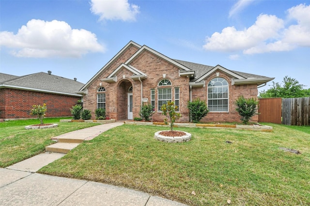 6609 Adobe Cir, The Colony, TX 75056 - traditional-style home with brick siding and a shingled roof