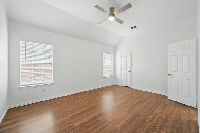 6609 Adobe Cir, The Colony, TX 75056 - spare room featuring a ceiling fan, dark wood finished floors, baseboards, and vaulted ceiling