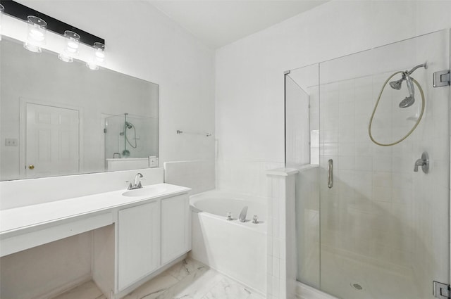 6609 Adobe Cir, The Colony, TX 75056 - full bathroom with a shower stall, a garden tub, vanity, and marble look tiles
