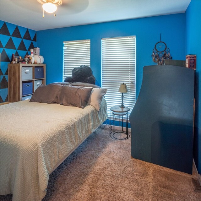 3506 Bryan St, Sachse, TX 75048 - carpeted bedroom with a ceiling fan and an accent wall