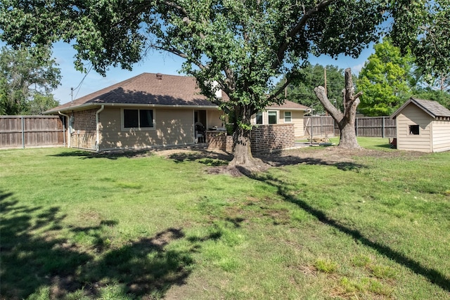 3506 Bryan St, Sachse, TX 75048 - back of property with brick siding and an outdoor structure