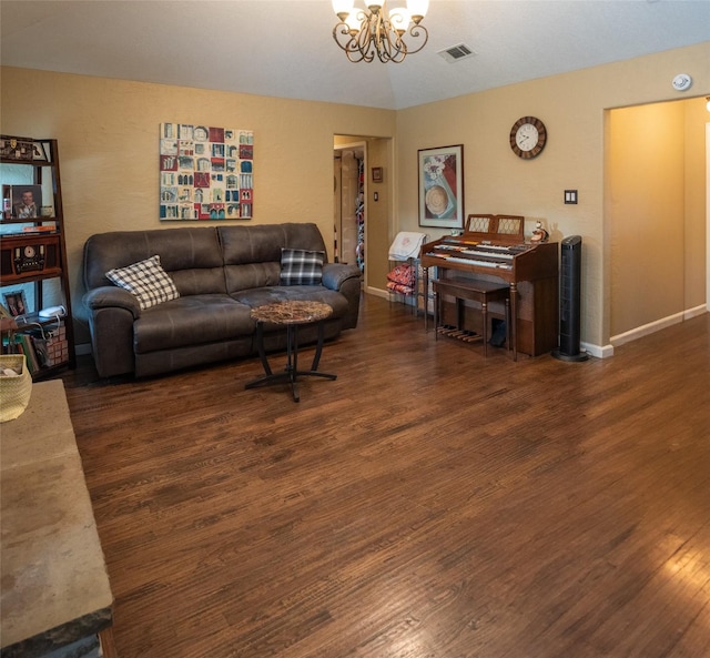 3506 Bryan St, Sachse, TX 75048 - living room with wood finished floors, a chandelier, and baseboards